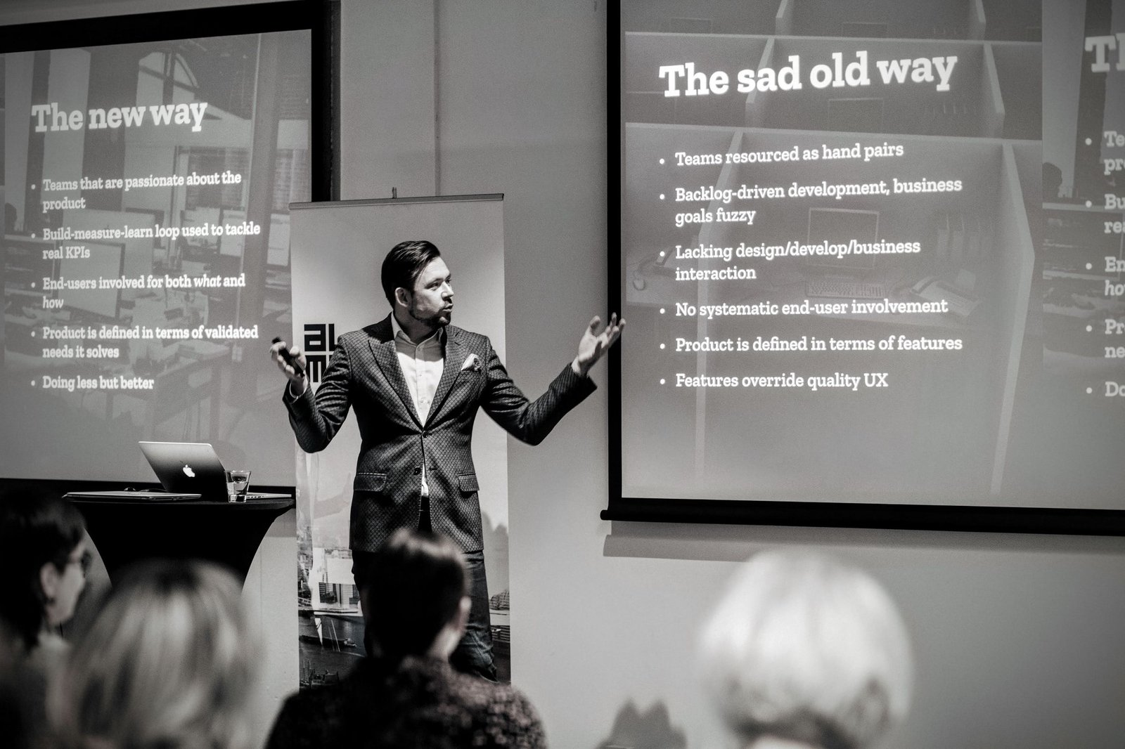 Matias Pietilä speaking on stage